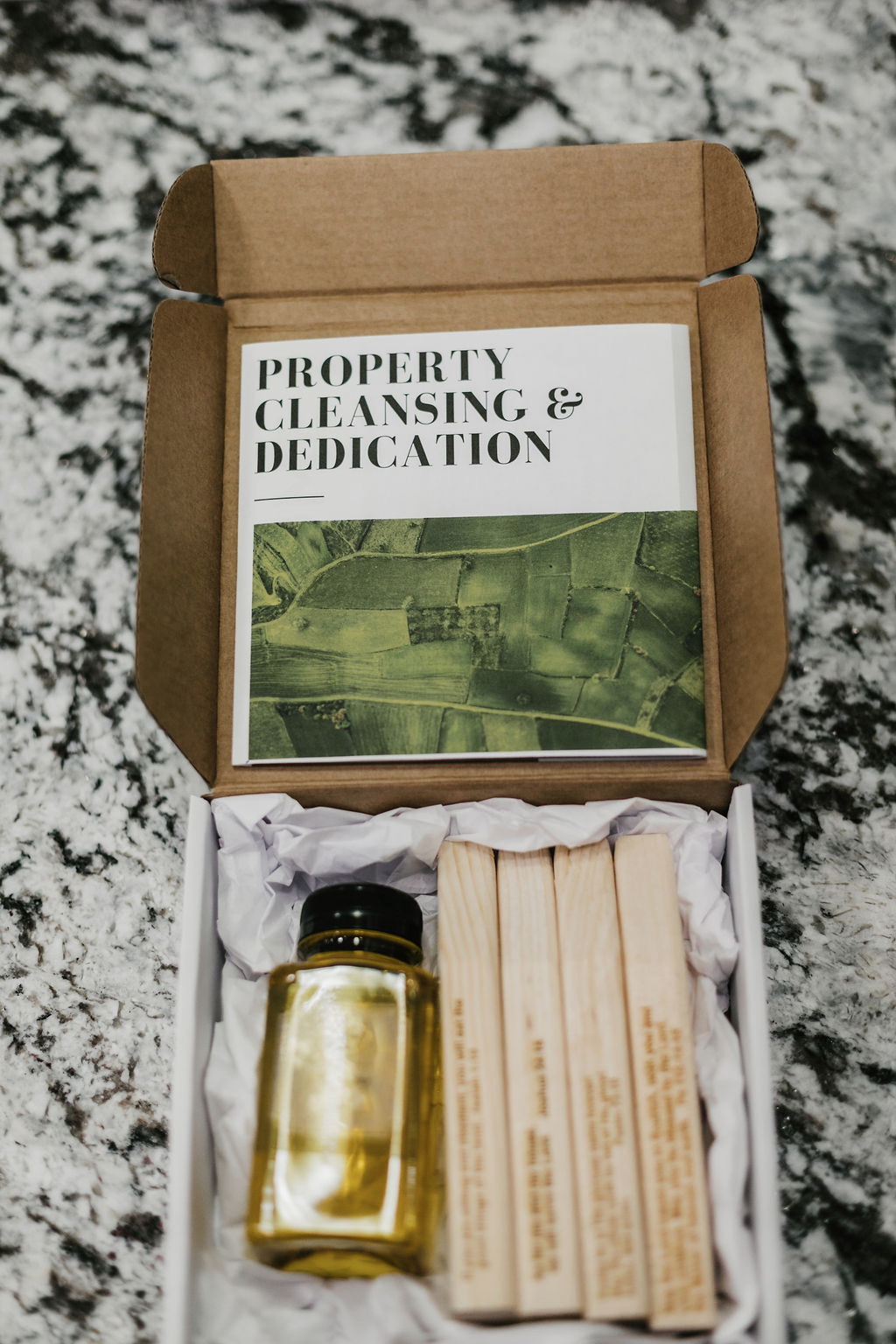 Property Cleansing & Dedication kit with booklet, anointing oil, and engraved scripture stakes